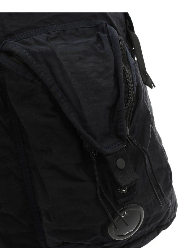 iKRIX C.P. COMPANY: zaini - Portafoglio bifold in nylon con tracolla