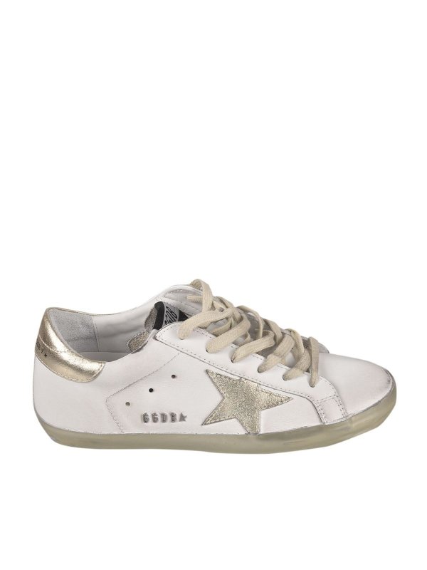 GOLDEN GOOSE: trainers - Superstar sneakers in white and gold