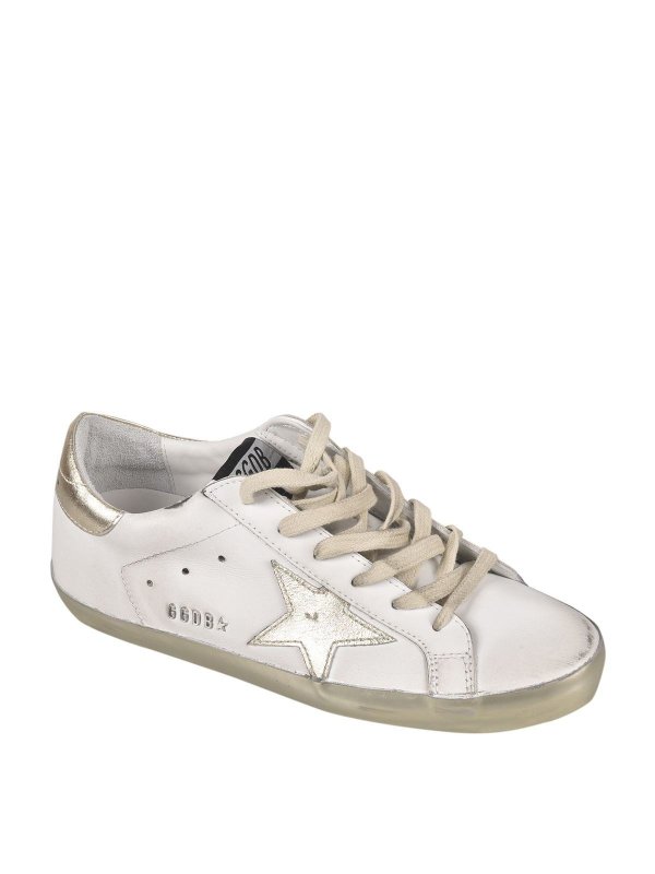 GOLDEN GOOSE: trainers online - Superstar sneakers in white and gold