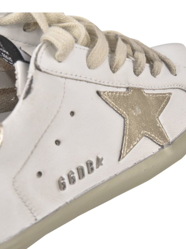 Superstar sneakers in white and gold shop online: GOLDEN GOOSE