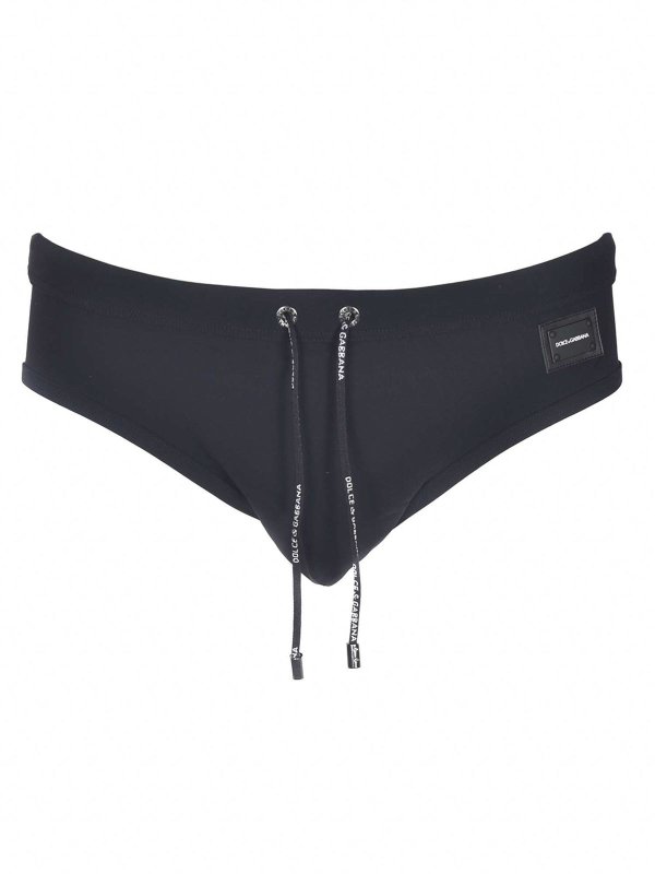 DOLCE & GABBANA: Swim shorts & swimming trunks - Logo patch swim briefs in black