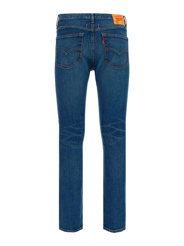 JUNYA WATANABE: jeans dritti, a sigaretta online - Jeans con patch a contrasto