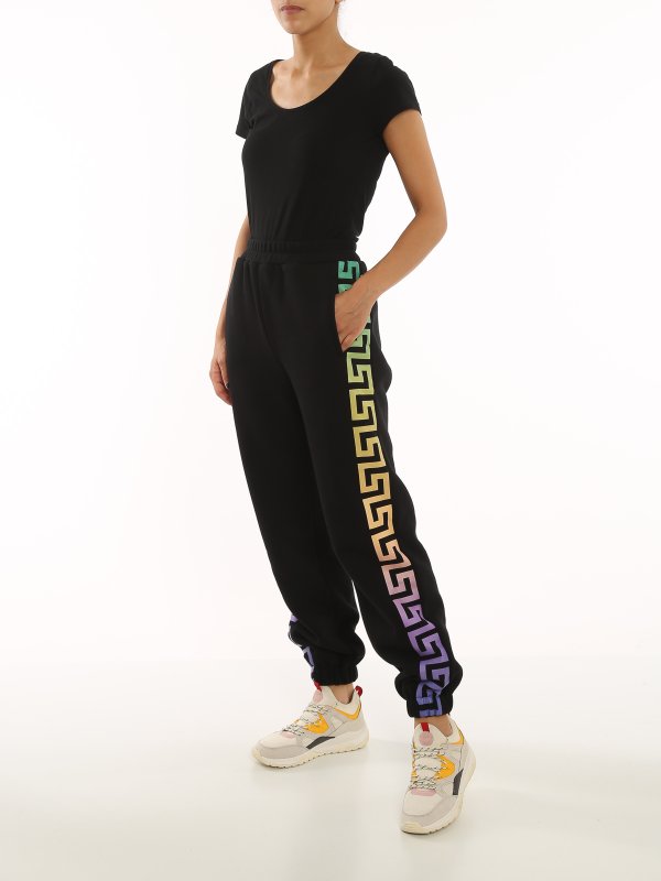 VERSACE: tracksuit bottoms online - Greca-print track pants