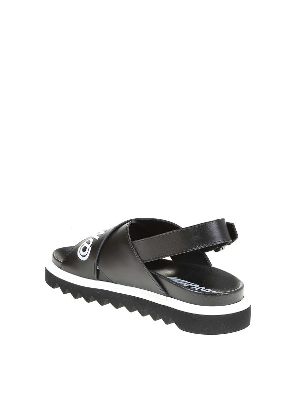 Moschino Leather criss-cross sandals - Black | MB16065G1DGA000B