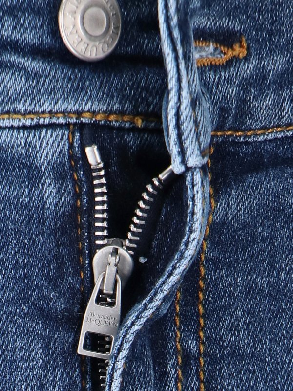 Faded flared jeans shop online: ALEXANDER MCQUEEN