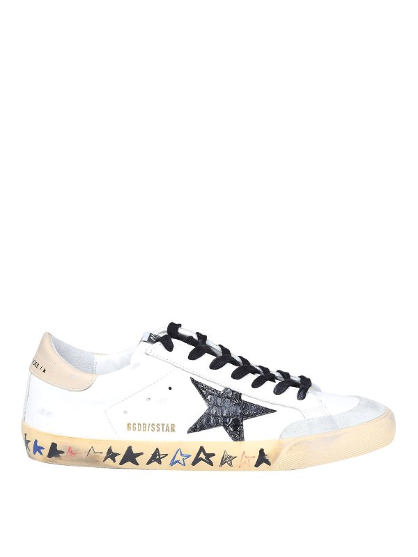GOLDEN GOOSE: trainers - Superstar sneakers in black and white leather