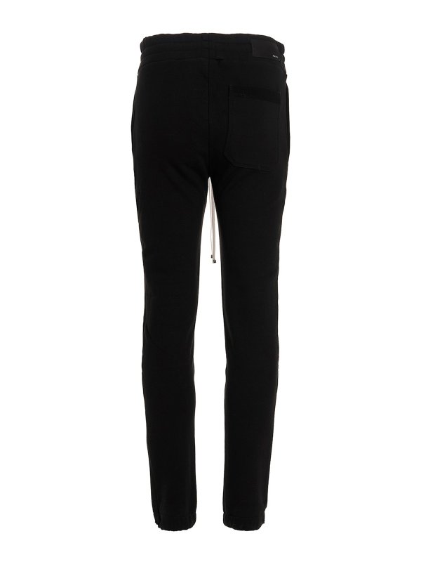 AMIRI: tracksuit bottoms online - Logo joggers