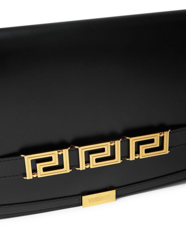 Leather clutch shop online: VERSACE