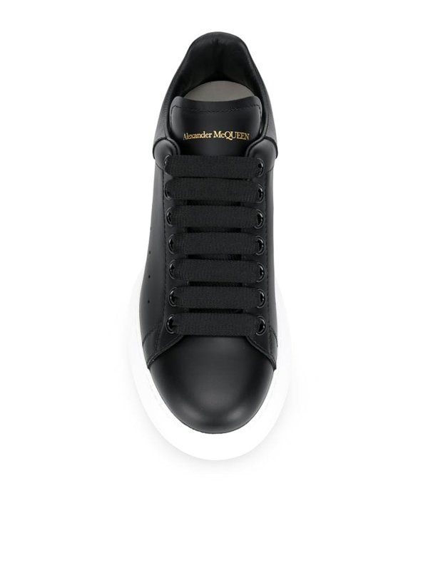 Black leather oversized low-top sneakers shop online: ALEXANDER MCQUEEN