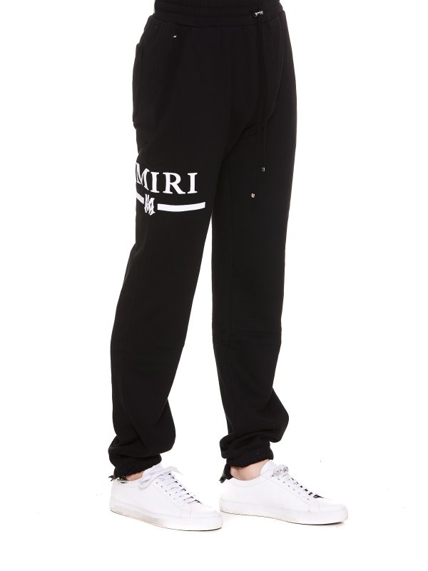 AMIRI: スウェットパンツ online - トラックスーツ ボトムス - 黒