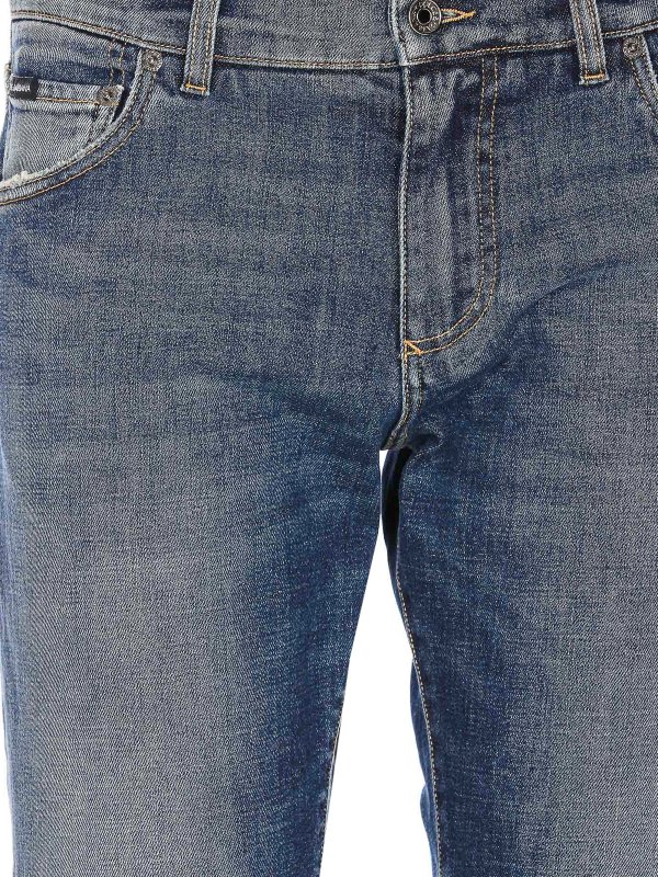 Jeans in denim con zip e placca logo shop online: DOLCE & GABBANA