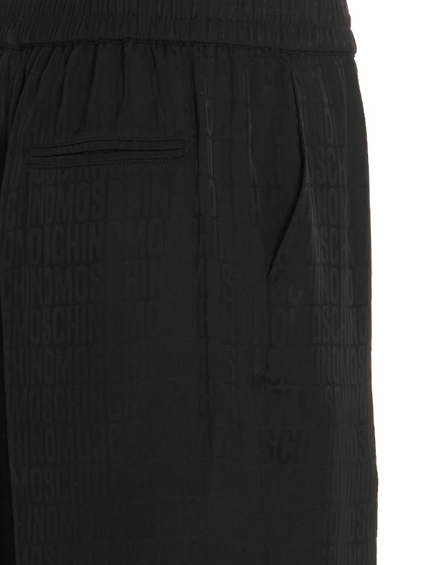 Monogram bermuda shorts shop online: MOSCHINO