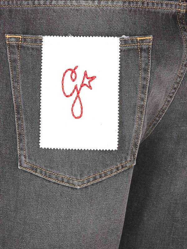 The Best Shops GOLDEN GOOSE: flared jeans - Wide leg Jeans with faded effect and logo