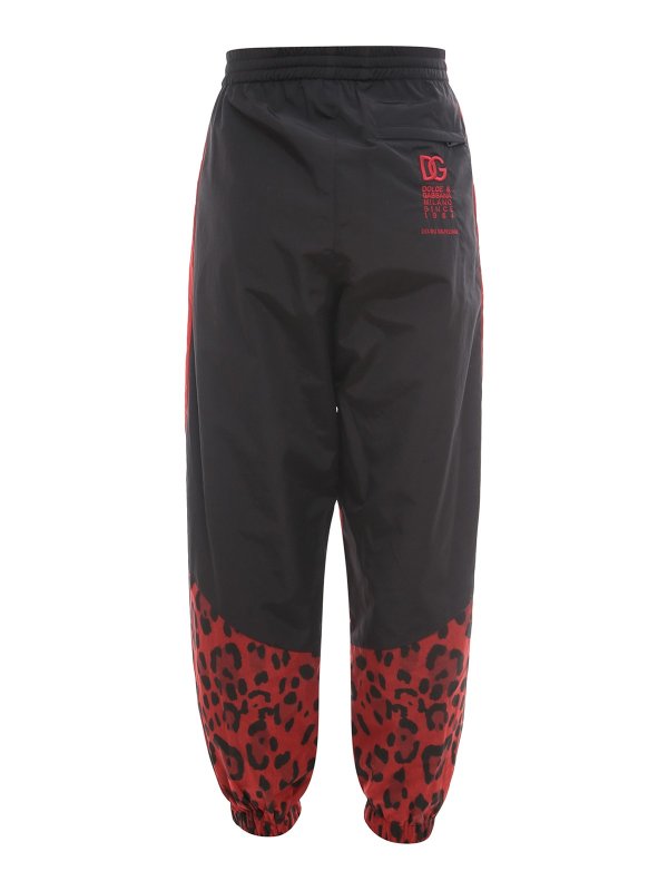 DOLCE & GABBANA: tracksuit bottoms online - Nylon trouser with animalier print
