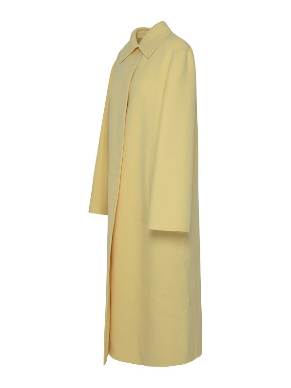 JIL SANDER: long coats online - Yellow wool coat