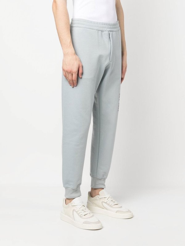 ALEXANDER MCQUEEN: Chándales online - Mono - Gris