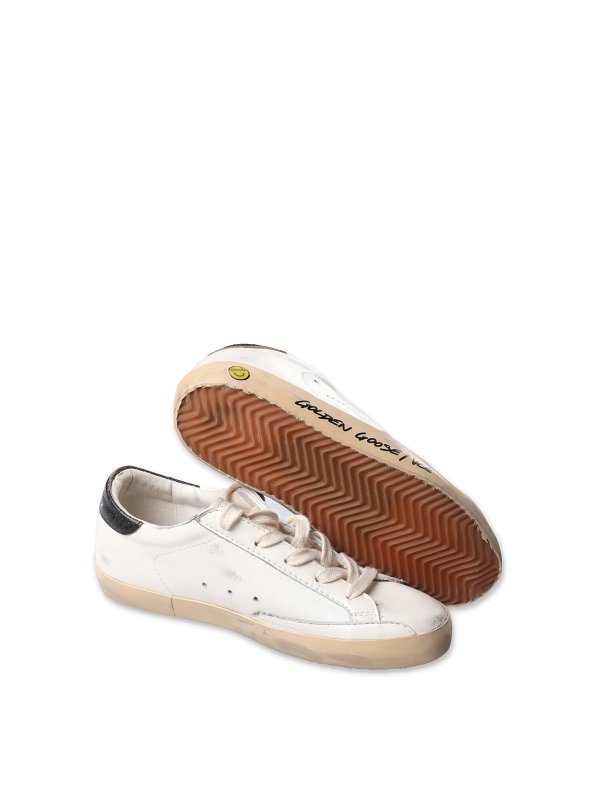 GOLDEN GOOSE: trainers online - Leather sneakers with laces