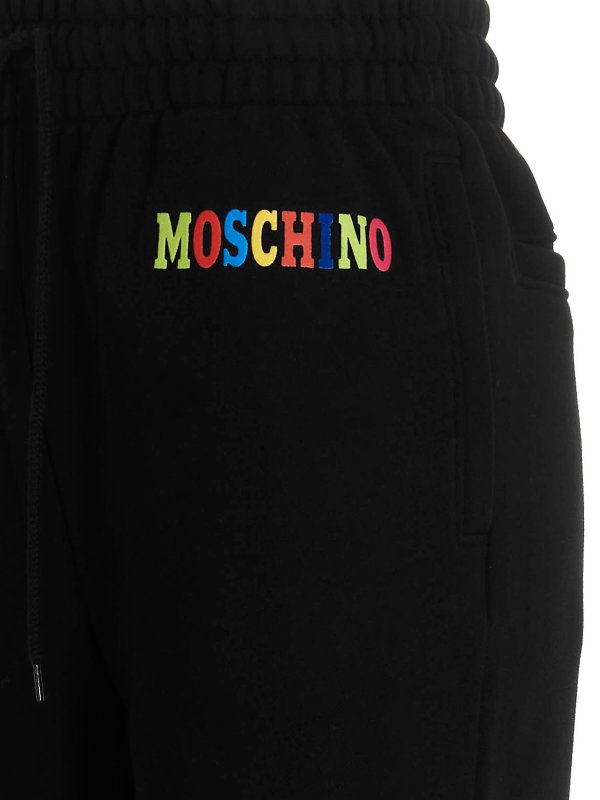 iKRIX MOSCHINO: スウェットパンツ - トラックスーツ ボトムス - 黒