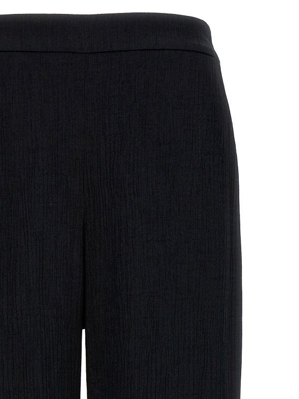 The Best Shops EMANUEL UNGARO: カジュアルトラウザー - カジュアルパンツ - 黒