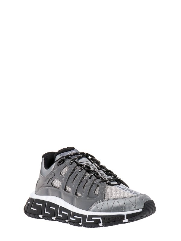 VERSACE: trainers online - Leather sneakers with reflective effect