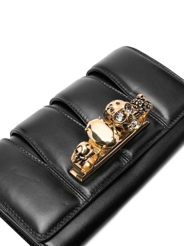 The slash leather clutch bag shop online: ALEXANDER MCQUEEN