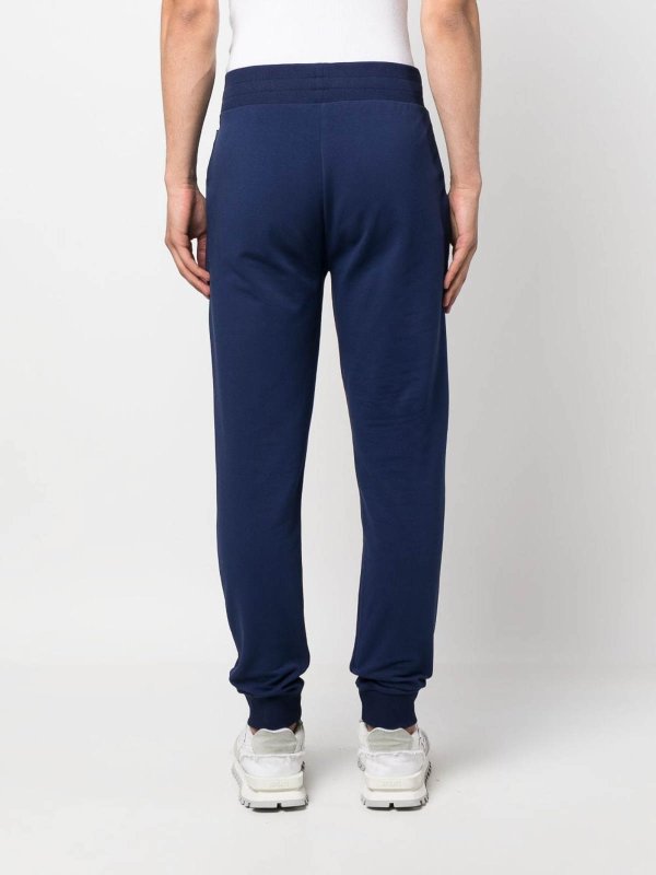 MOSCHINO: Trousers Shorts online - Logo-Patch Track Pants