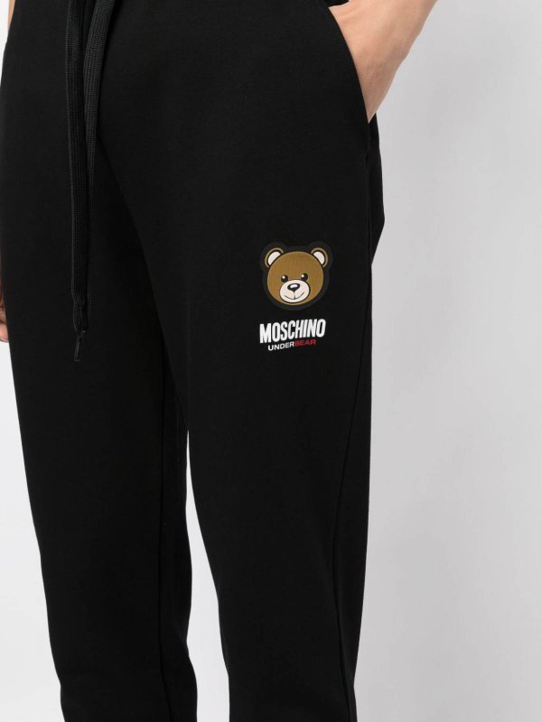 MOSCHINO: Trousers Shorts online - Logo-Patch Track Pants