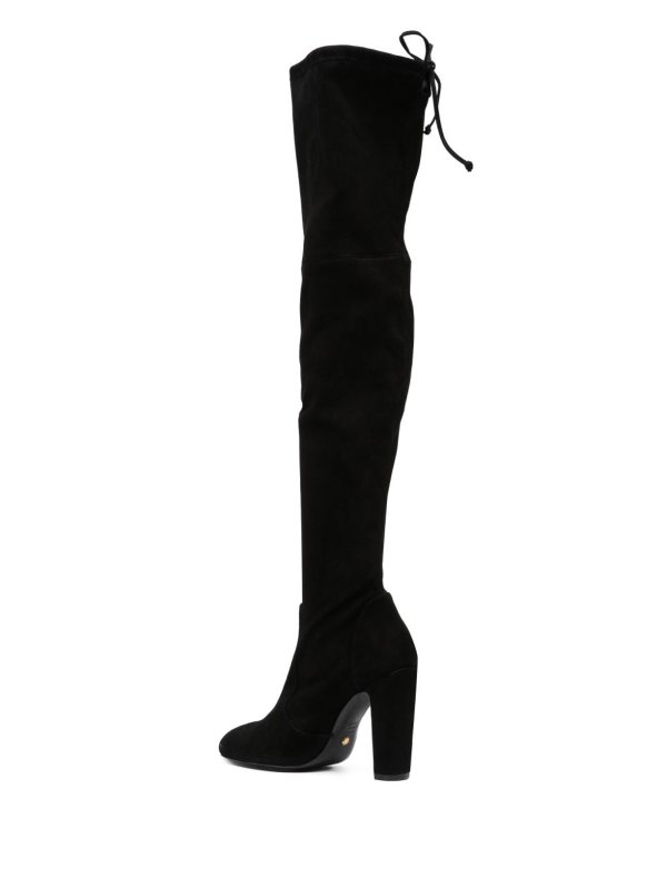 Black above-knee boots. shop online: Stuart Weitzman