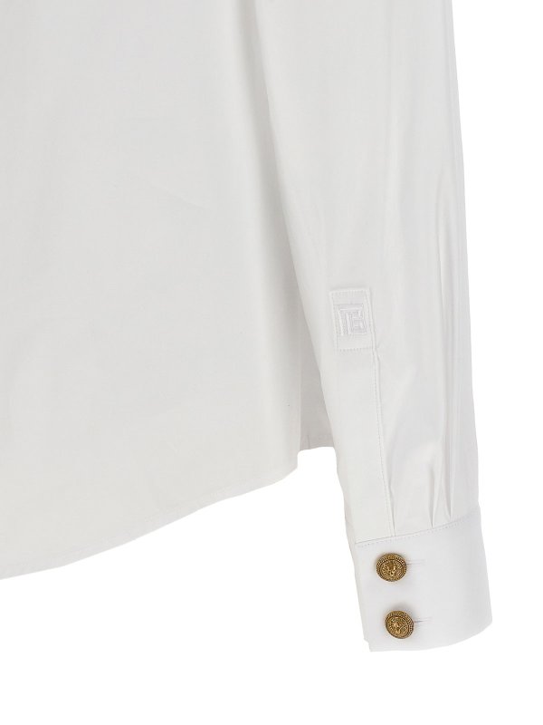 Logo button shirt shop online: Balmain