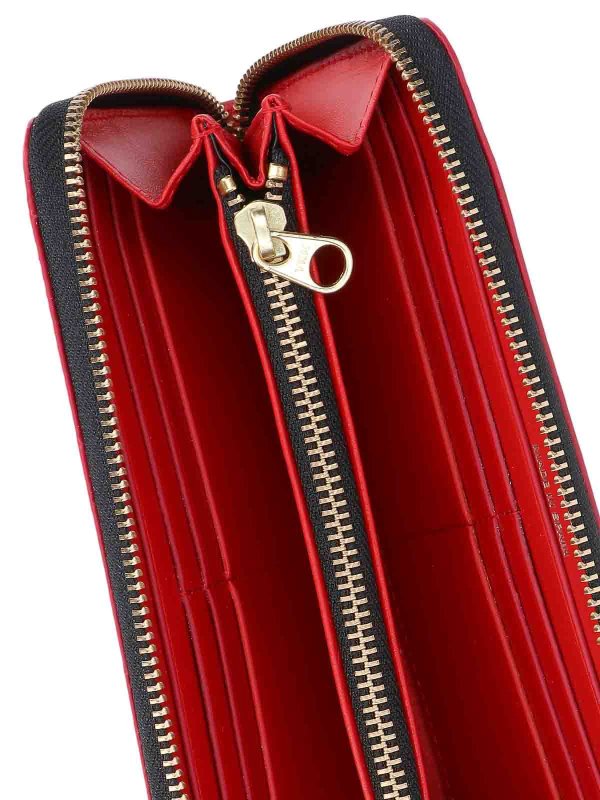 Logo zip wallet shop online: COMME DES GARCONS