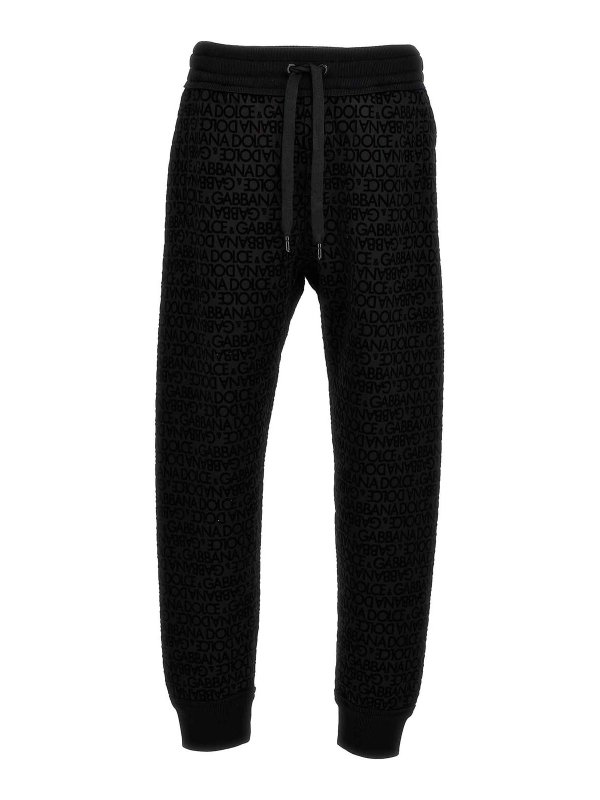 DOLCE & GABBANA: tracksuit bottoms - Flocked logo joggers