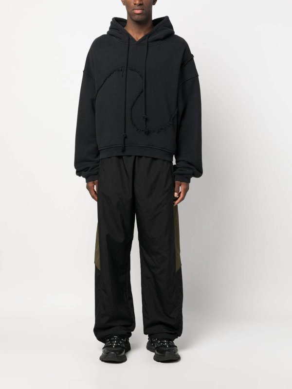 REEBOK: casual trousers online - `u vector blocked` track pants