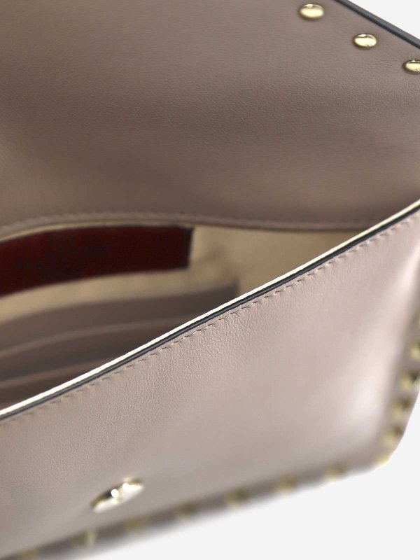 VALENTINO GARAVANI buy online Rockstud flat pochette in calfskin