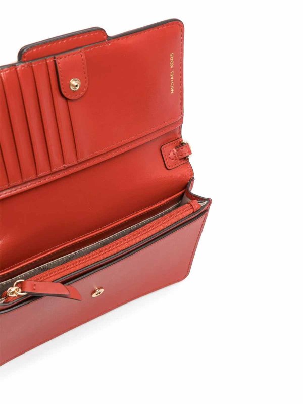 red clutch shop online: MICHAEL KORS