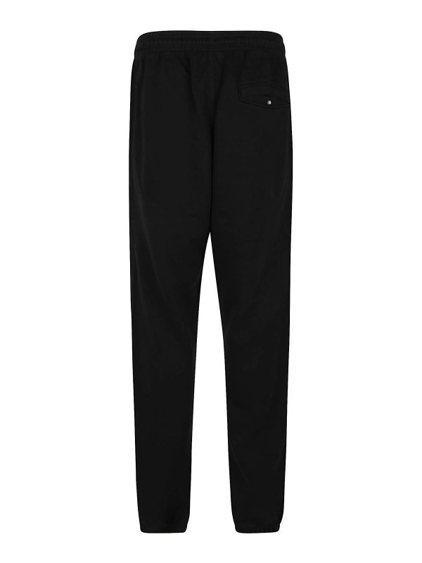 Marcelo Burlon: pantaloni sport online - Pantaloni della tuta relax incrociati