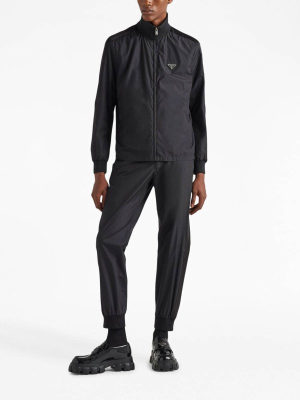 PRADA: tracksuit bottoms online - Triangle-logo silk track pants
