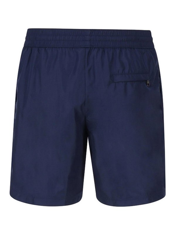 DOLCE & GABBANA: Swim shorts & swimming trunks online - Swim shorts with metal logo plate
