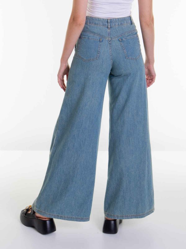 Jeans con zip shop online: MOSCHINO