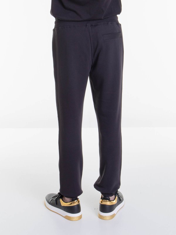 カジュアルパンツ - 黒 shop online: Versace Jeans Couture