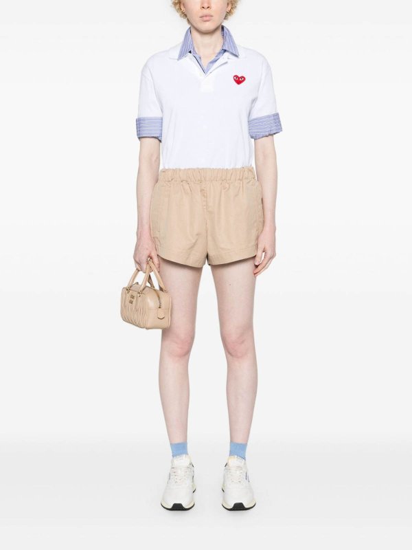 Polo - Blanc Replica 
online: COMME DES GARCONS