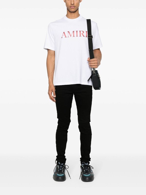 AMIRI: skinny jeans online - Stack Skinny Jeans