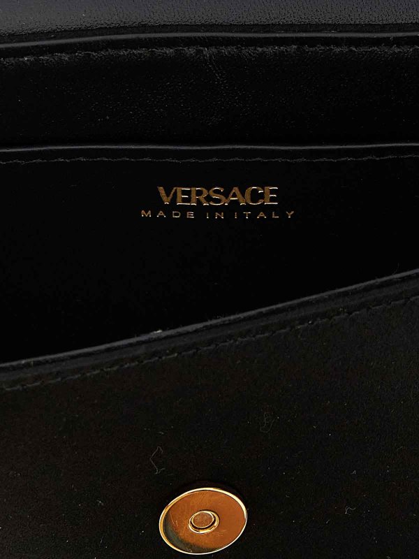 Clutch shop online: VERSACE