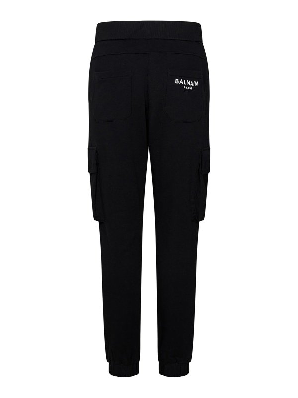 Balmain: Trousers Shorts online - Black Cotton Fleece Cargo Jogging Trousers