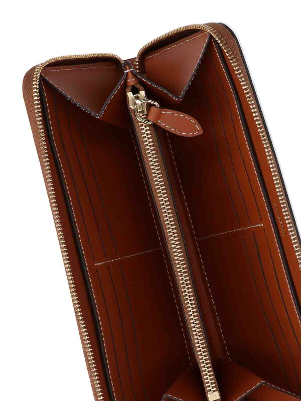 Zip wallet shop online: BURBERRY
