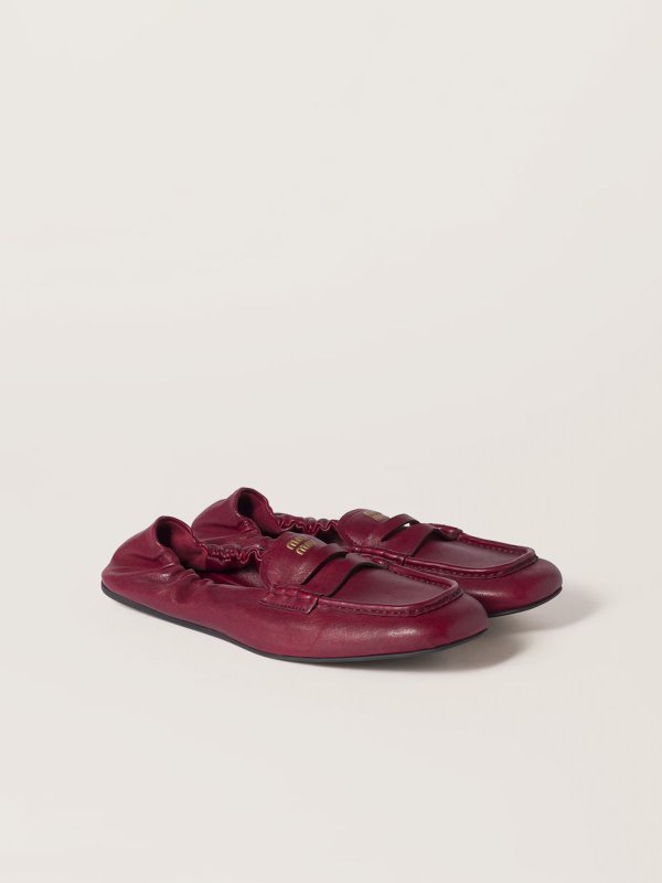 MIU MIU: Loafers & Slippers online - Embossed-Logo Loafers