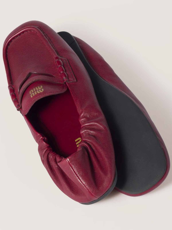 Embossed-Logo Loafers shop online: MIU MIU