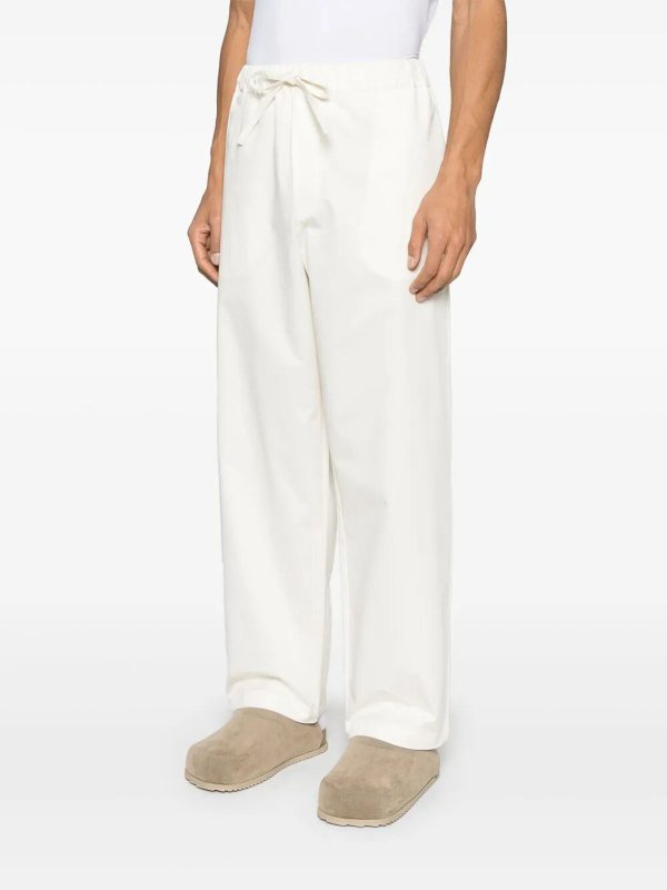 DARKPARK: スウェットパンツ online - トラックスーツ ボトムス - クリーム