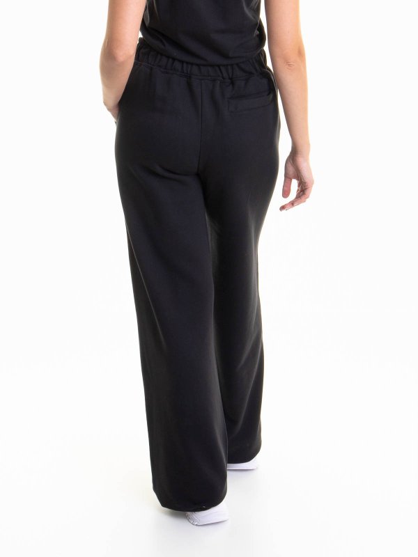 カジュアルパンツ - 黒 shop online: Versace Jeans Couture