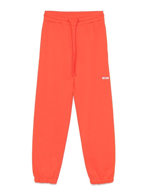 m.s.g.m.: スウェットパンツ - トラックスーツ ボトムス - オレンジ