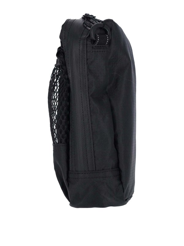 AND WANDER buy online Clutch - Schwarz